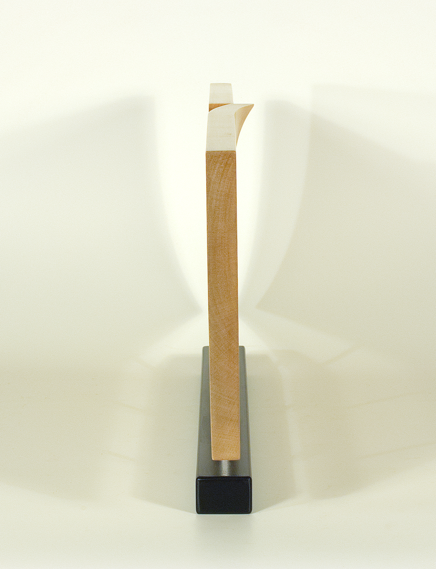 Modern sculpture in wood. Original in sycamore and stainless steel. 